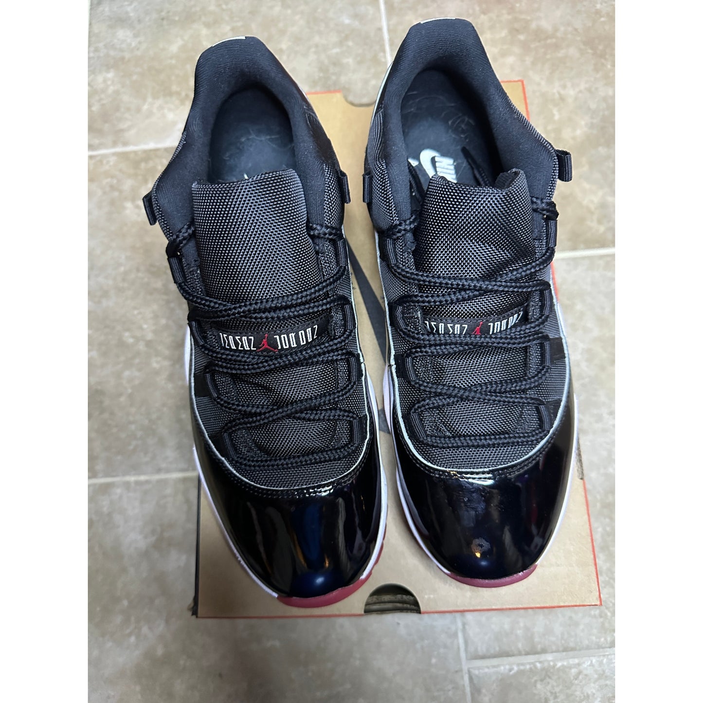 Size 10.5 - Jordan 11 Low "Bred" 2025