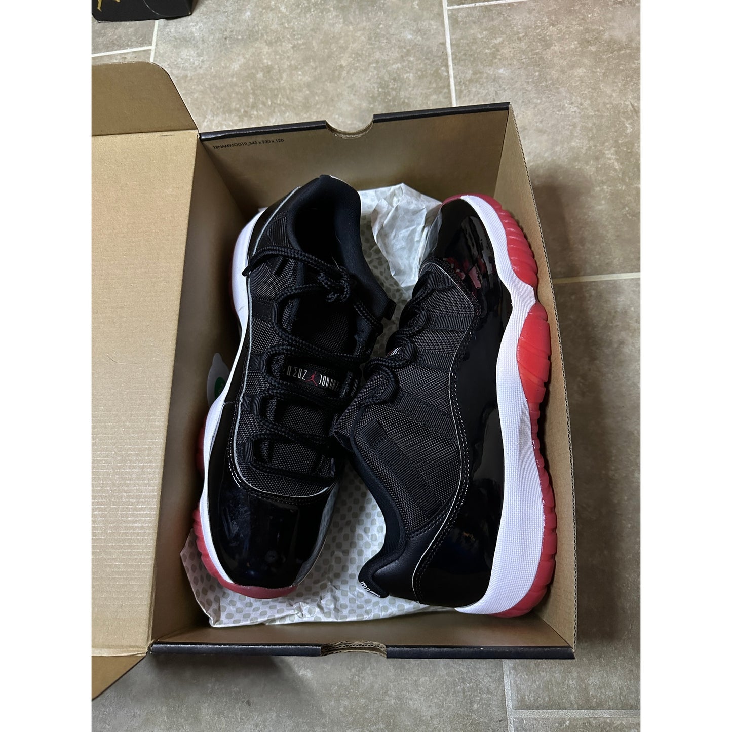 Size 10.5 - Jordan 11 Low "Bred" 2025